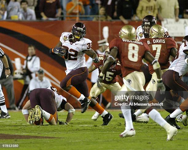 Virginia Tech tailback Cedric Humes rushes upfield against Florida State at the 2005 ACC Football Championship Game in Jacksonville, Flordia on...