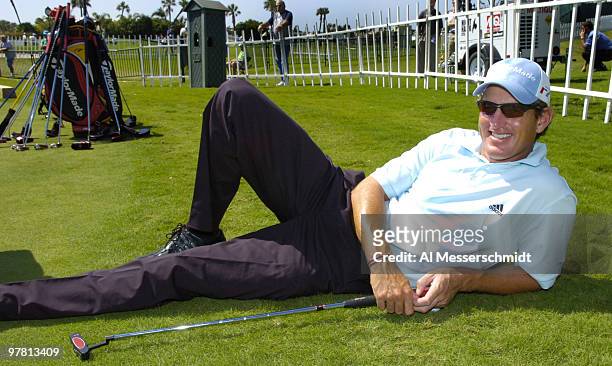 Greg Owen rest near the practice putting green at the 2006 Honda Classic March 7 at the Country Club at Mirasol in Palm Beach Gardens, Florida.