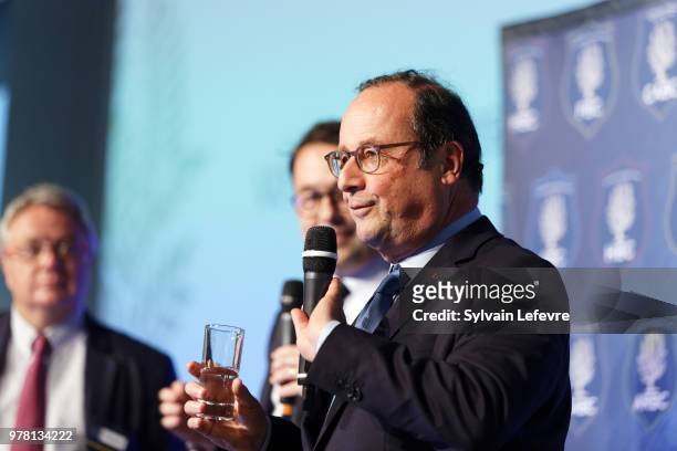 Former French President Francois Hollande delivers a speech during a lunch organized by the 'Flandres Business Club' on June 18, 2018 in Lille,...