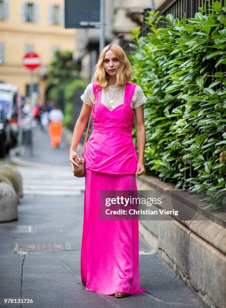 Candela Novembre wearing pink dress is seen outside Stella McCartney during Milan Men's Fashion Week Spring/Summer 2019 on June 18, 2018 in Milan,...