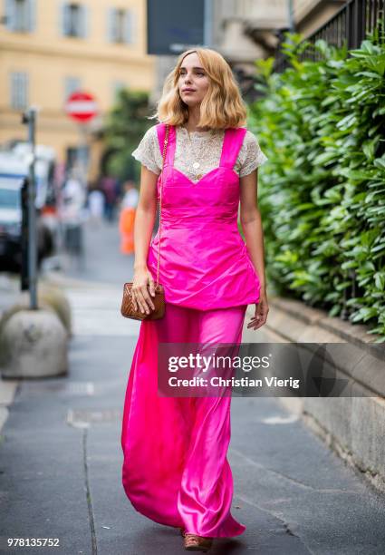 Candela Novembre wearing pink dress is seen outside Stella McCartney during Milan Men's Fashion Week Spring/Summer 2019 on June 18, 2018 in Milan,...