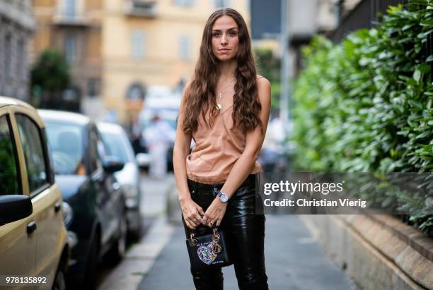 Erika Boldrin wearing black leather pants is seen outside Stella McCartney during Milan Men's Fashion Week Spring/Summer 2019 on June 18, 2018 in...