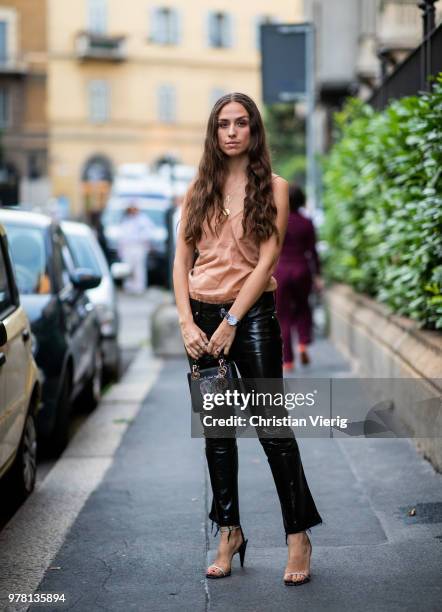 Erika Boldrin wearing black leather pants is seen outside Stella McCartney during Milan Men's Fashion Week Spring/Summer 2019 on June 18, 2018 in...