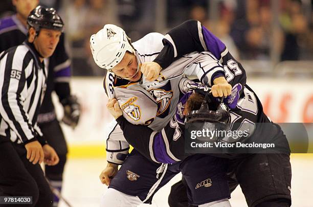 Jordin Tootoo of the Nashville Predators fights Richard Clune of Los Angeles Kings in the second period of their NHL game at the Staples Center on...