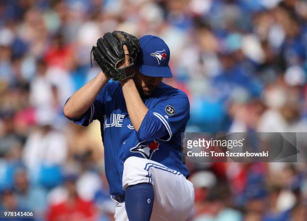 Marco Estrada of the Toronto Blue Jays delivers a pitch in the fifth inning during MLB game action against the Washington Nationals at Rogers Centre...