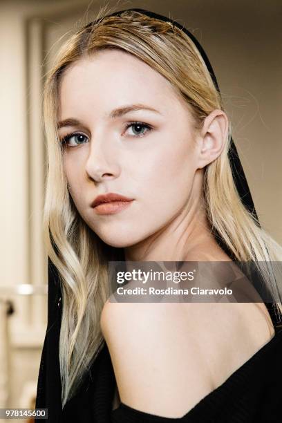 Model is seen backstage ahead of the Sartorial Monk show during Milan Men's Fashion Week Spring/Summer 2019 on June 18, 2018 in Milan, Italy.