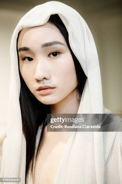 Model is seen backstage ahead of the Sartorial Monk show during Milan Men's Fashion Week Spring/Summer 2019 on June 18, 2018 in Milan, Italy.