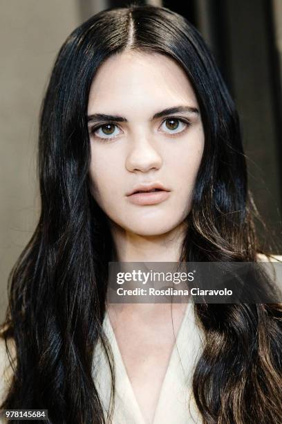 Model is seen backstage ahead of the Sartorial Monk show during Milan Men's Fashion Week Spring/Summer 2019 on June 18, 2018 in Milan, Italy.