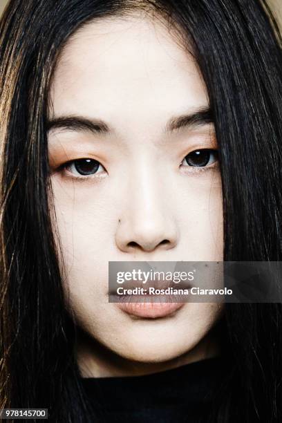 Model is seen backstage ahead of the Sartorial Monk show during Milan Men's Fashion Week Spring/Summer 2019 on June 18, 2018 in Milan, Italy.