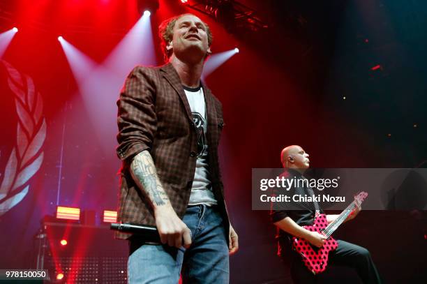 Corey Taylor and Josh Rand of Stone Sour perform live on stage at The Roundhouse on June 18, 2018 in London, England.