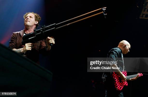 Corey Taylor and Josh Rand of Stone Sour perform live on stage at The Roundhouse on June 18, 2018 in London, England.