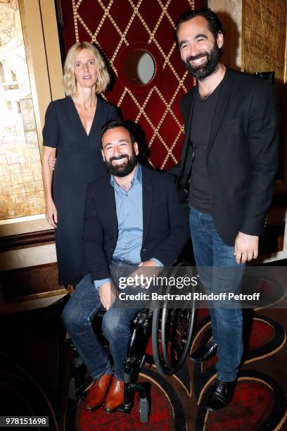 Support of the event Sandrine Kiberlain standing with Creators of the Association "Comme les autres" Olympic champion in wheelchair tennis Michael...