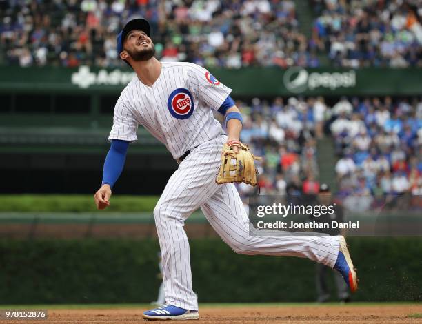 Kris Bryant of the Chicago Cubs moves to the ball against the Pittsburgh Pirates at Wrigley Field on June 8, 2018 in Chicago, Illinois. The Cubs...