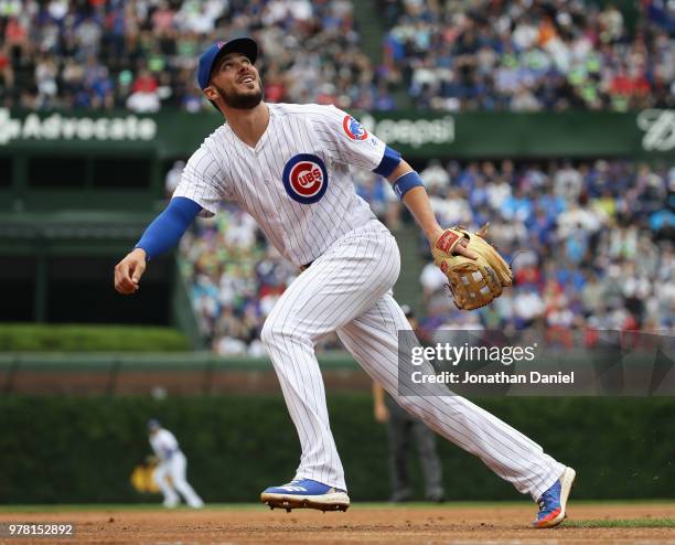 Kris Bryant of the Chicago Cubs moves to the ball against the Pittsburgh Pirates at Wrigley Field on June 8, 2018 in Chicago, Illinois. The Cubs...