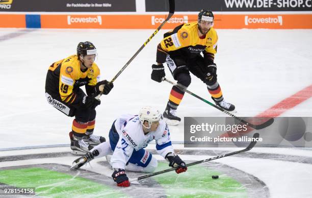 April 2018, Wolfsburg, Germany: Ice hockey, Germany vs France, Eis Arena: Germany's Maximillian Kammerer and Matthias Plachta in action against...