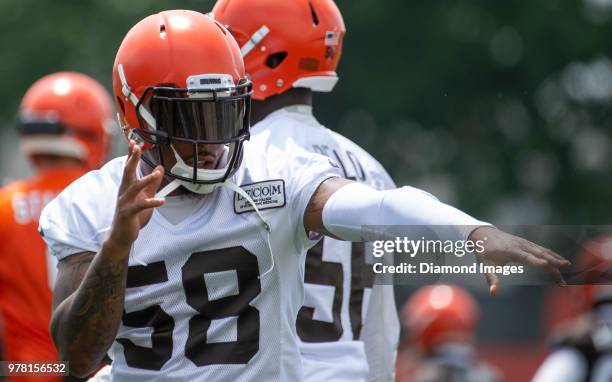 Linebacker Christian Kirksey of the Cleveland Browns poses for a picture as he stretches during a mandatory mini camp on June 13, 2018 at the...