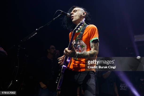 Christian Martucci of Stone Sour performs live on stage at The Roundhouse on June 18, 2018 in London, England.