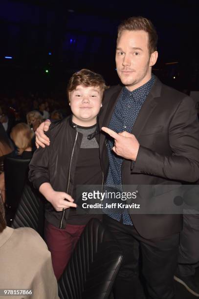 Actors Jeremy Ray Taylor and Chris Patt attend the 2018 MTV Movie And TV Awards at Barker Hangar on June 16, 2018 in Santa Monica, California.