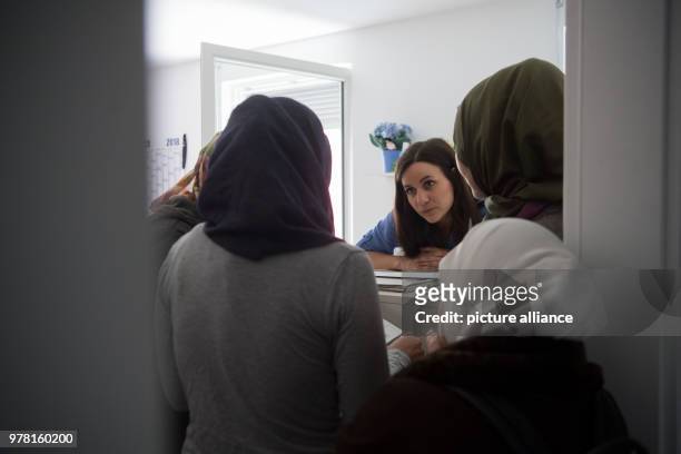 April 2018, Metzingen, Germany: Maha Zaghi , Integration manager of the City helping Refugees from different countries, at one of the Refugee...