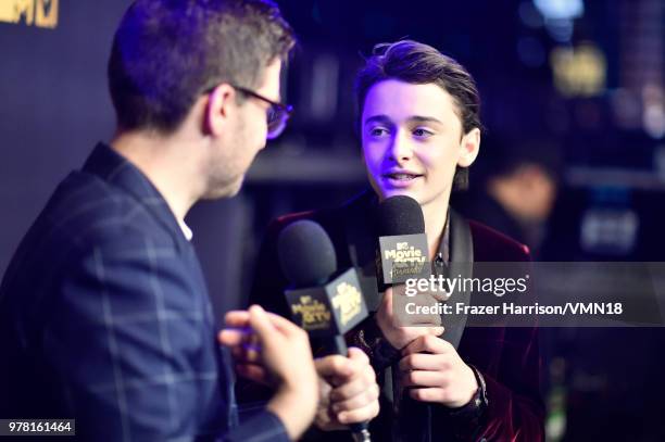 Actor Noah Schnapp attends the 2018 MTV Movie And TV Awards at Barker Hangar on June 16, 2018 in Santa Monica, California.