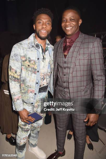 Actor Chadwick Boseman and James Shaw Jr. Attend the 2018 MTV Movie And TV Awards at Barker Hangar on June 16, 2018 in Santa Monica, California.