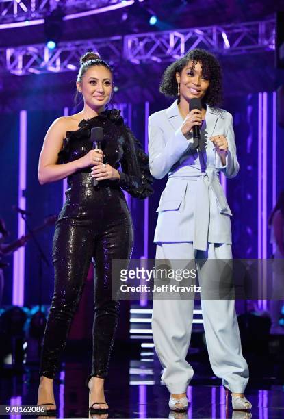 Actors Francia Raisa and Yara Shahidi speak onstage at the 2018 MTV Movie And TV Awards at Barker Hangar on June 16, 2018 in Santa Monica, California.