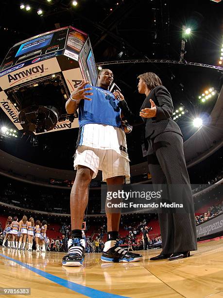 Dwight Howard of the Orlando Magic is interviewed after the game against the San Antonio Spurs by ESPN personality Lisa Salters on March 17, 2010 at...