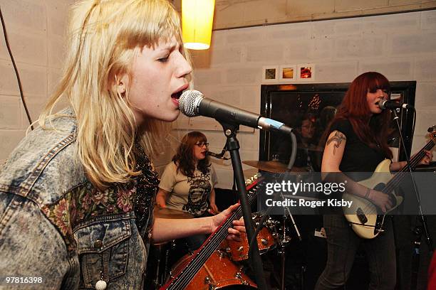 Cassie Ramone, Ali Koehler and Katy Goodman Kickball Katy of The Vivian Girls perform onstage at a secret show at Mrs. Bea's as part of SXSW 2010 on...