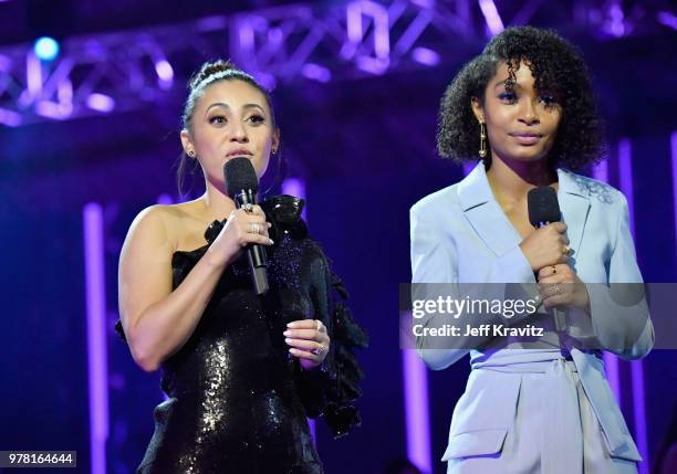 Actors Francia Raisa and Yara Shahidi speak onstage at the 2018 MTV Movie And TV Awards at Barker Hangar on June 16, 2018 in Santa Monica, California.