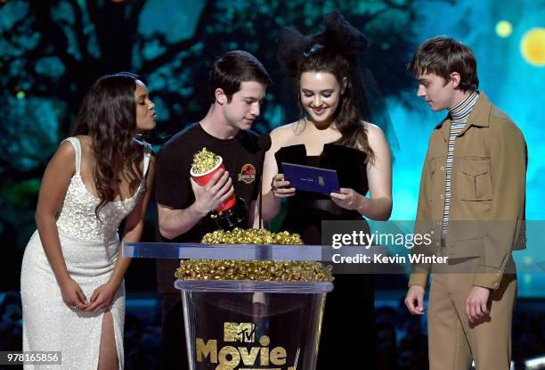 Actors Alisha Boe, Dylan Minnette, Katherine Langford, and Miles Heizer speak onstage during the 2018 MTV Movie And TV Awards at Barker Hangar on...