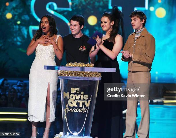 Actors Alisha Boe, Dylan Minnette, Katherine Langford, and Miles Heizer speak onstage during the 2018 MTV Movie And TV Awards at Barker Hangar on...