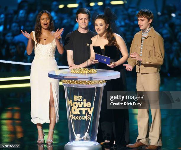 Actors Alisha Boe, Dylan Minnette, Katherine Langford, and Miles Heizer speak onstage during the 2018 MTV Movie And TV Awards at Barker Hangar on...