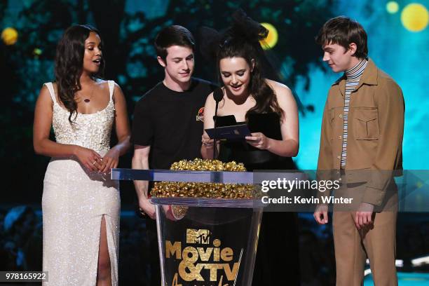 Actors Alisha Boe, Dylan Minnette, Katherine Langford, and Miles Heizer speak onstage during the 2018 MTV Movie And TV Awards at Barker Hangar on...