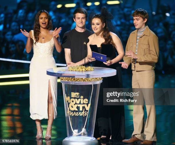 Actors Alisha Boe, Dylan Minnette, Katherine Langford, and Miles Heizer speak onstage during the 2018 MTV Movie And TV Awards at Barker Hangar on...