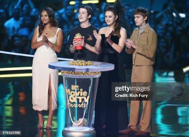 Actors Alisha Boe, Dylan Minnette, Katherine Langford, and Miles Heizer speak onstage during the 2018 MTV Movie And TV Awards at Barker Hangar on...