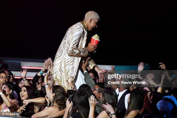 Actor Keiynan Lonsdale accepts the Best Kiss award for 'Love, Simon' onstage during the 2018 MTV Movie And TV Awards at Barker Hangar on June 16,...