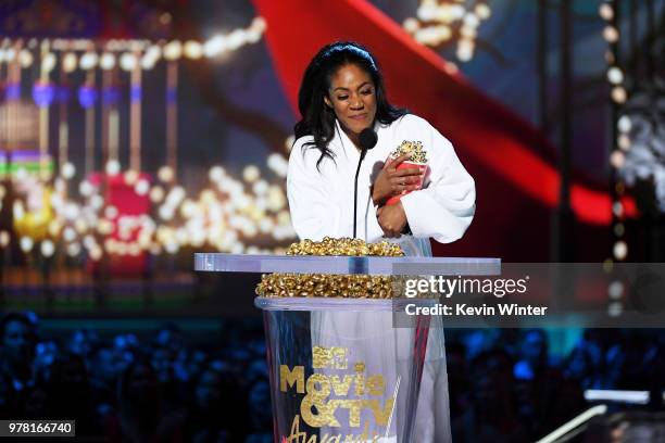 Actor Tiffany Haddish accepts the Best Comedic Performance award for 'Girls Trip' onstage during the 2018 MTV Movie And TV Awards at Barker Hangar on...