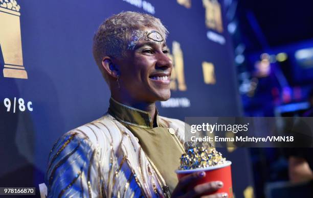 Actor Keiynan Lonsdale, winner of the Best Kiss award for 'Love, Simon,' attends the 2018 MTV Movie And TV Awards at Barker Hangar on June 16, 2018...