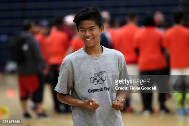 Student tries judo during the Olympic Refugee Sport Day at The Trusts Arena on June 19, 2018 in Auckland, New Zealand. The event saw refugees aged...