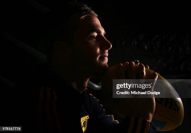 Tom Mitchell poses during a Hawthorn Hawks AFL press conference at Waverley Park on June 19, 2018 in Melbourne, Australia.