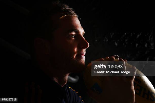 Tom Mitchell poses during a Hawthorn Hawks AFL press conference at Waverley Park on June 19, 2018 in Melbourne, Australia.