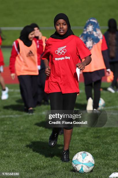 Students play football during the Olympic Refugee Sport Day at The Trusts Arena on June 19, 2018 in Auckland, New Zealand. The event saw refugees...