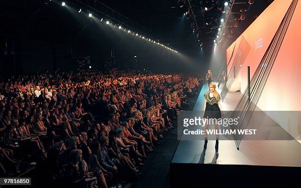 Model parades during a show by Australian label Joveeba during the Melbourne Fashion Festival, in Melbourne on March 18, 2010. The Festival is the...