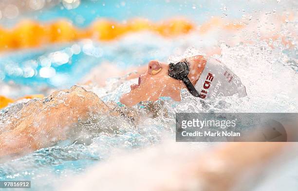 Sophie Edington of Queensland competes in the womens 100 metre Backstroke final during day three of the 2010 Australian Swimming Championships at...