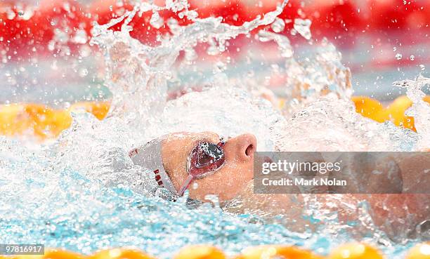 Emily Seebohm of Queensland competes in the Womens 100 metre Backstroke final during day three of the 2010 Australian Swimming Championships at...