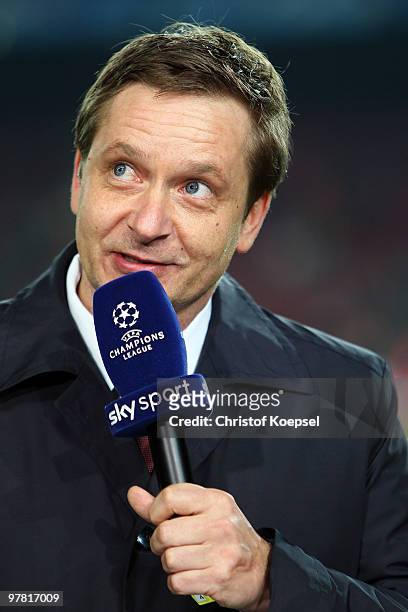 Manager Horst Heldt of Stuttgart speaks to sky television channel before the UEFA Champions League round of sixteen second leg match between FC...