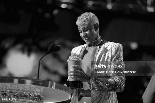 Actor Keiynan Lonsdale accepts the Best Kiss award for 'Love Simon' onstage during the 2018 MTV Movie And TV Awards at Barker Hangar on June 16, 2018...