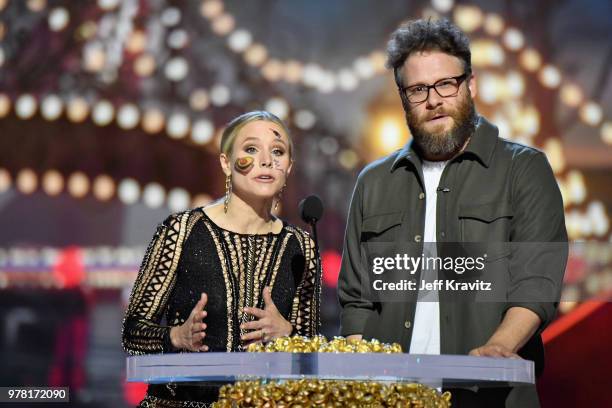 Actors Kristen Bell and Seth Rogen speak onstage at the 2018 MTV Movie And TV Awards at Barker Hangar on June 16, 2018 in Santa Monica, California.