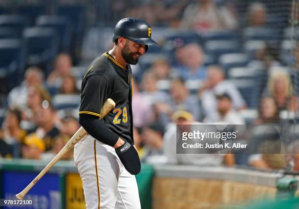 Francisco Cervelli of the Pittsburgh Pirates celebrates after scoring on a RBI double in the seventh inning at PNC Park on June 18, 2018 in...