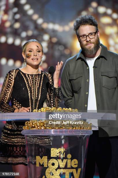 Actors Kristen Bell and Seth Rogen speak onstage at the 2018 MTV Movie And TV Awards at Barker Hangar on June 16, 2018 in Santa Monica, California.